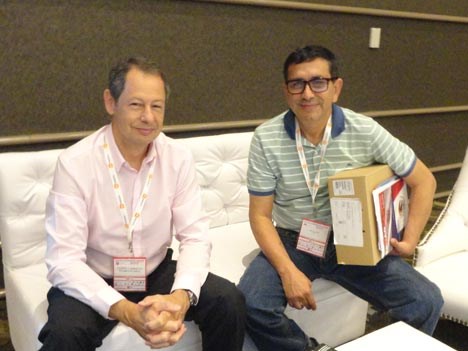 Gabriel Carballo, de Red Multicable, con Carlos Cibils, de CBC Coronel Bogado Cable